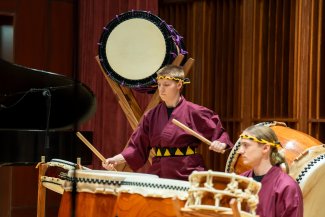 Students Performing on Drums